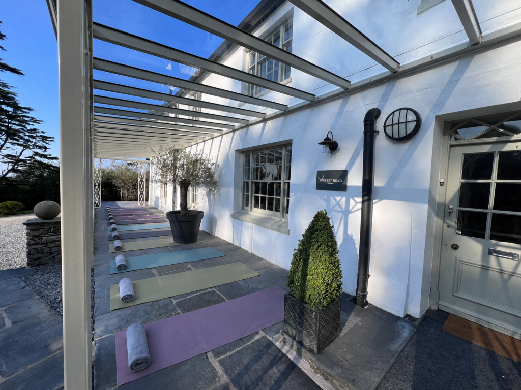Push back the tables and set up your own yoga retreat at Orrest Head House Windermere.