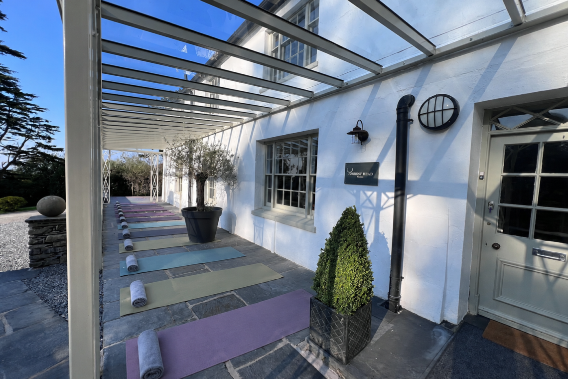 Push back the tables and set up your own yoga retreat at Orrest Head House Windermere.